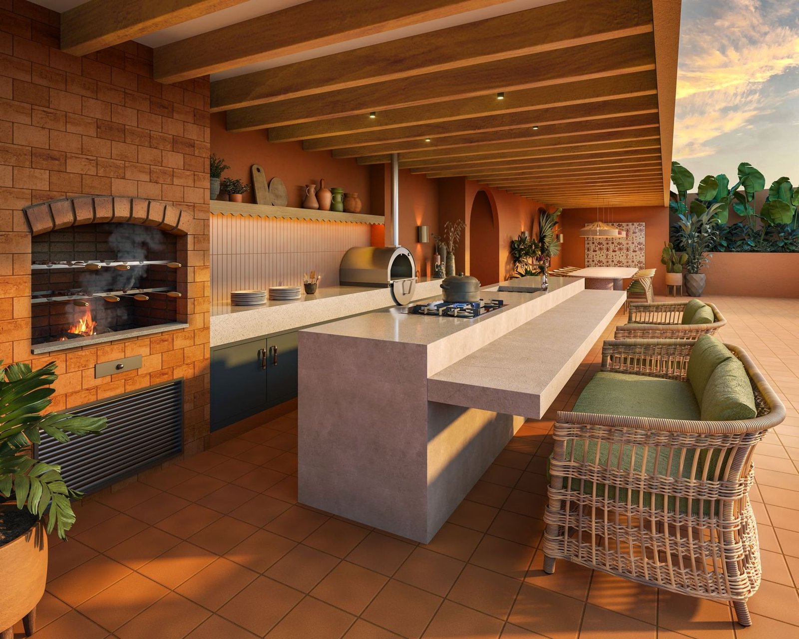 Espaço gourmet com churrasqueira, forno de pizza e cooktop no rooftop do Gaví