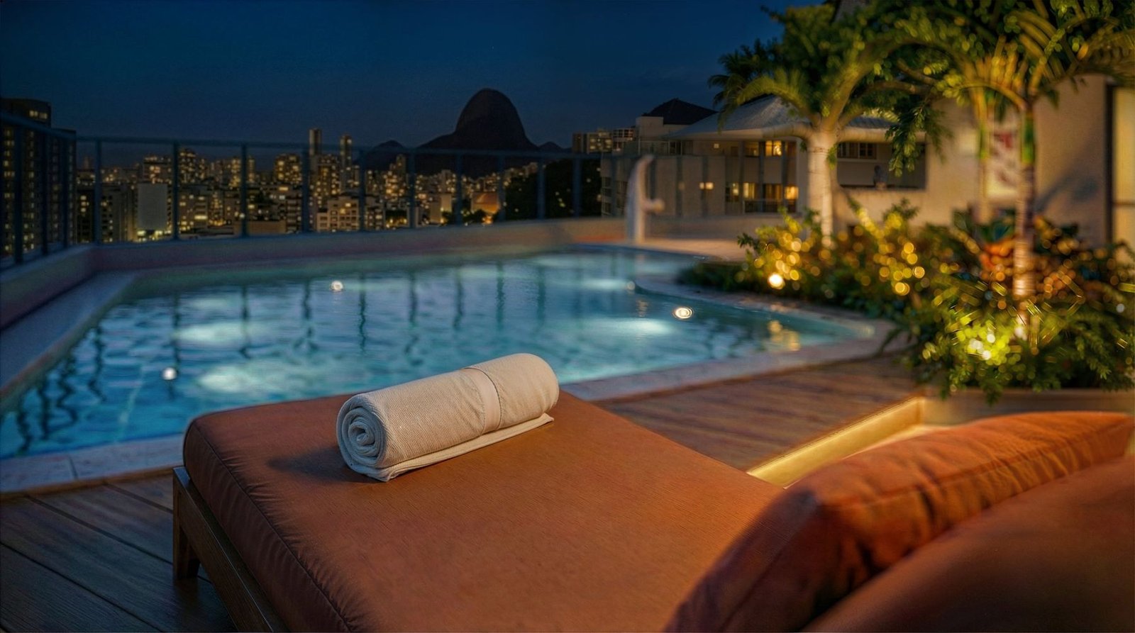 Piscina do Guima Botafogo à noite com vista para o Pão de Açúcar